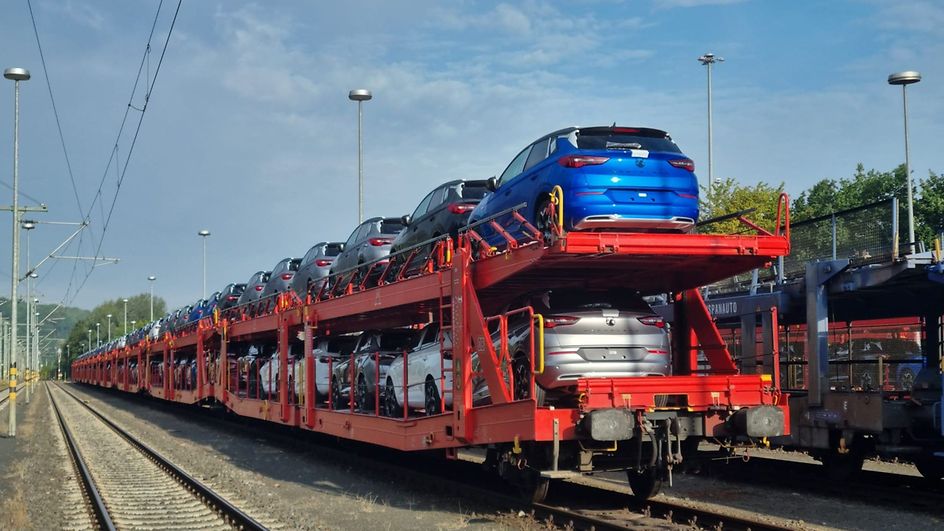Car carrier wagons with vehicles at the Opel plant